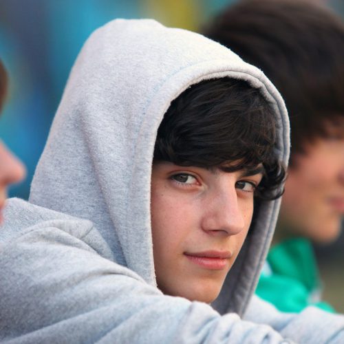 Teenage boy with hoodie